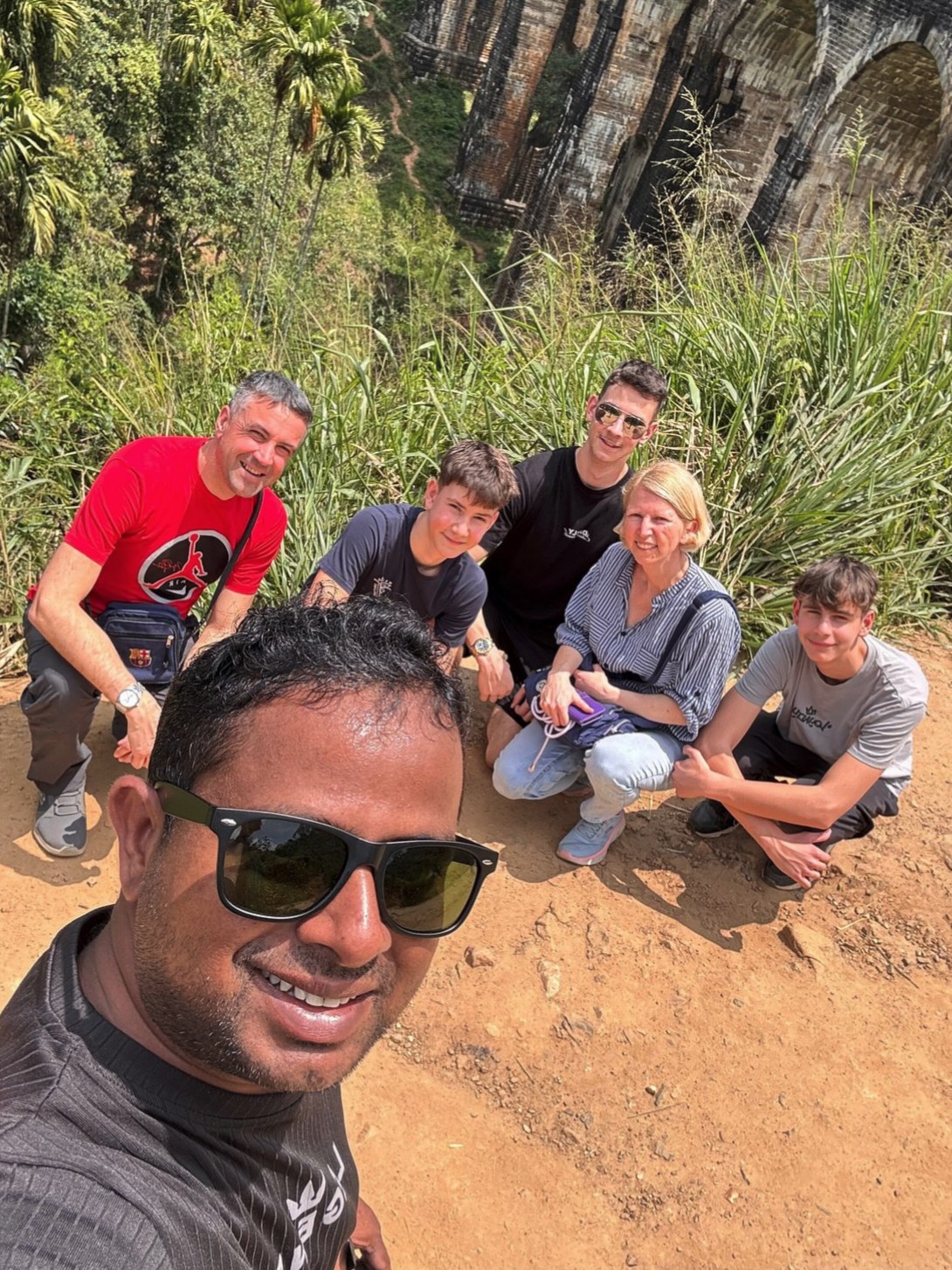 Family travellers near Nine Arch Bridge with a Sri Lanka driver