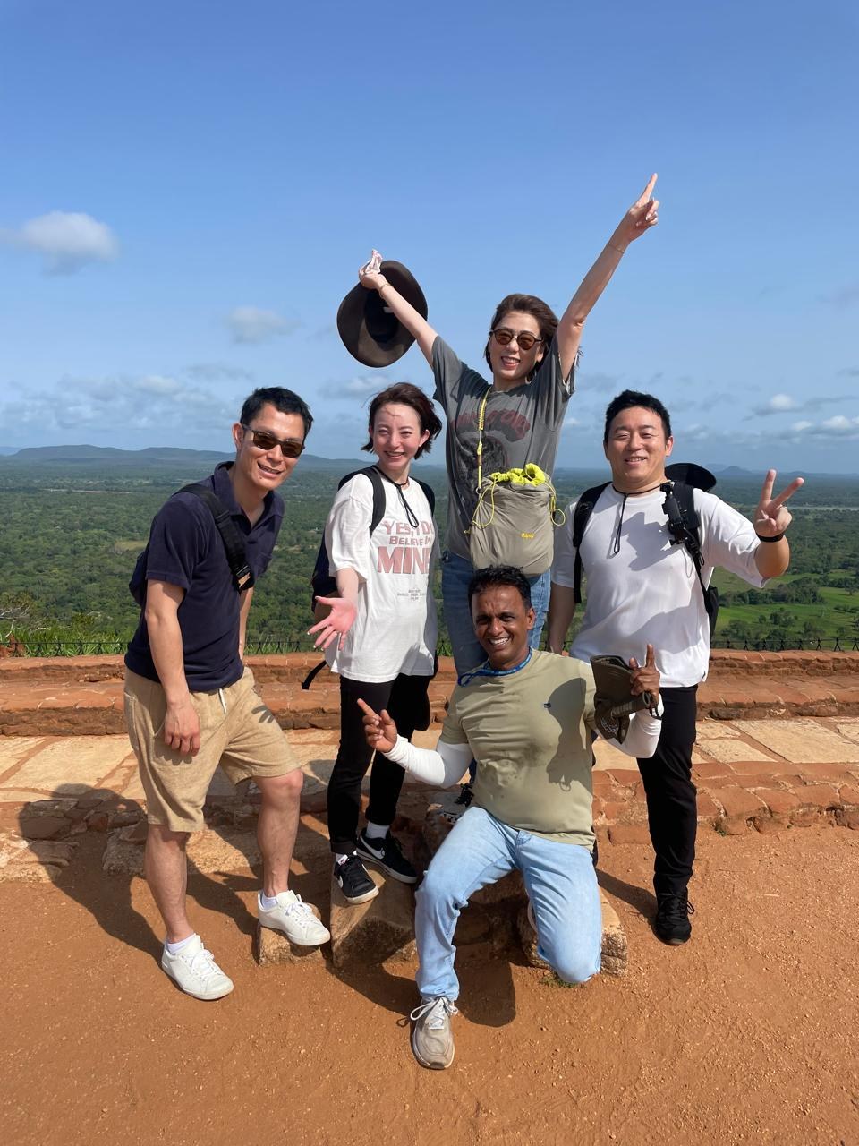 Travellers at a Sigiriya viewpoint with their private driver