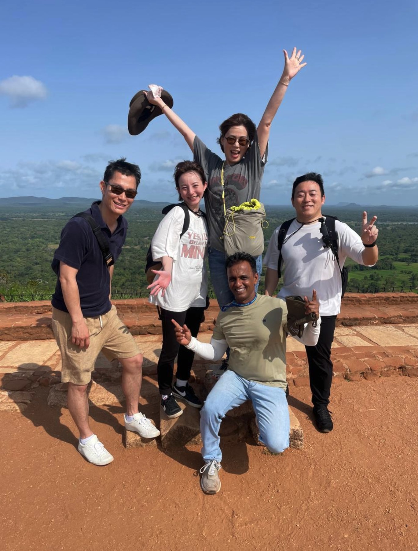 Travellers with their driver near Sigiriya in Sri Lanka