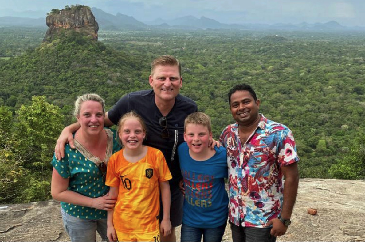 A family and their private driver at a Sigiriya viewpoint in Sri Lanka