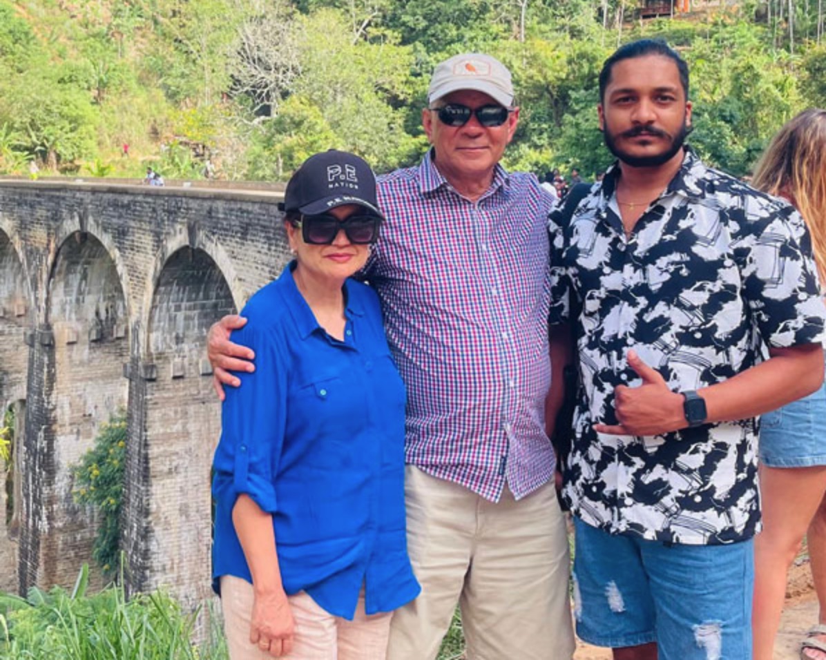 An older couple with their private driver at Nine Arch Bridge in Sri Lanka